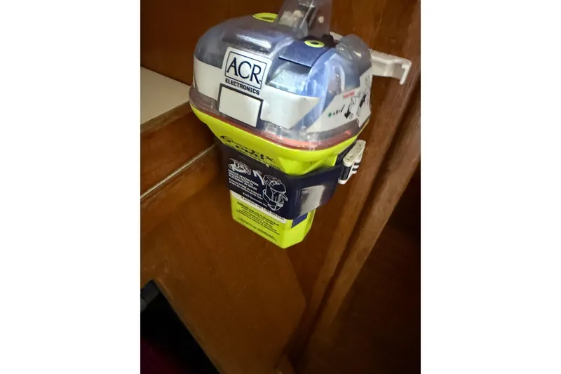 Slide: The Image of Emergency beacon mounted on a 1990 Island Packet 38 sailboat interior. - 27