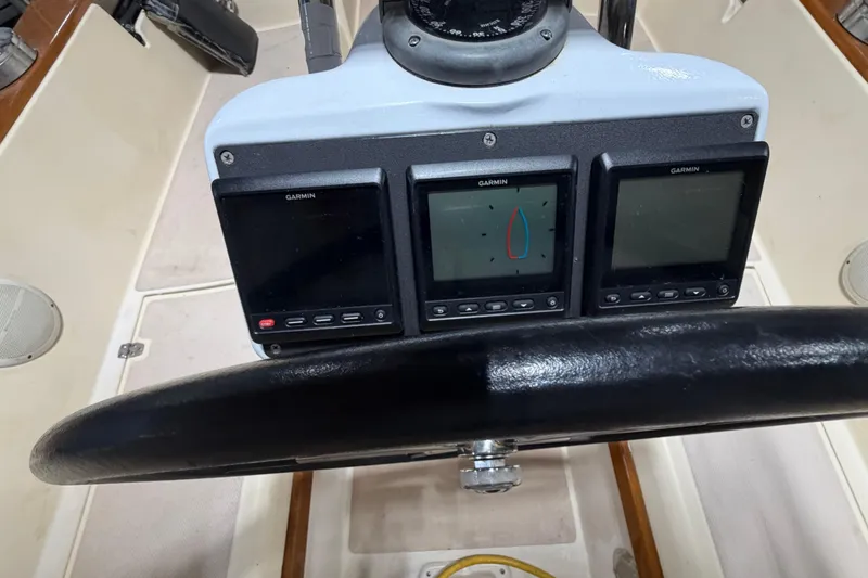 Slide: The Image of Cockpit of 1990 Island Packet 38 sailboat with Garmin navigation displays. - 49