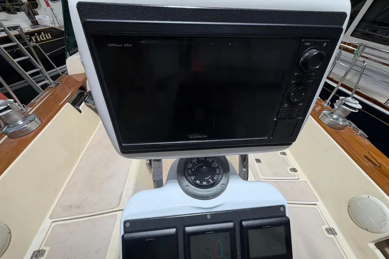 Slide: The Image of Cockpit of 1990 Island Packet 38 sailboat with Garmin GPS and compass. - 50