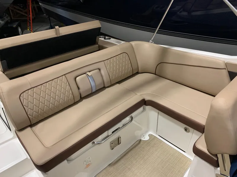 Slide: The Image of Beige seating with quilted pattern on a boat. - 14