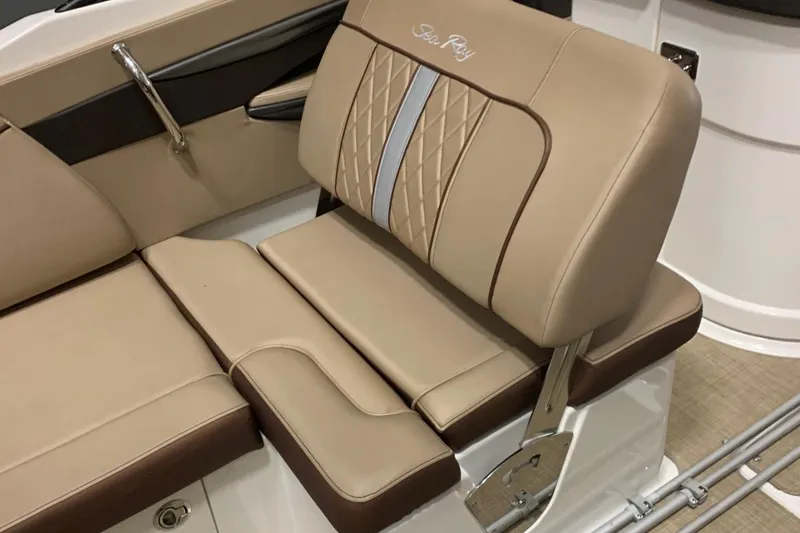 Slide: The Image of Beige seat with quilted pattern and metal bracket on a boat. - 18