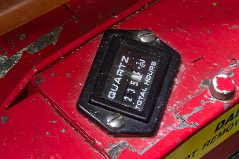 Slide: The Image of Hour meter showing 235 hours on a 1999 Sea Ray 340 Sundancer boat. - 25