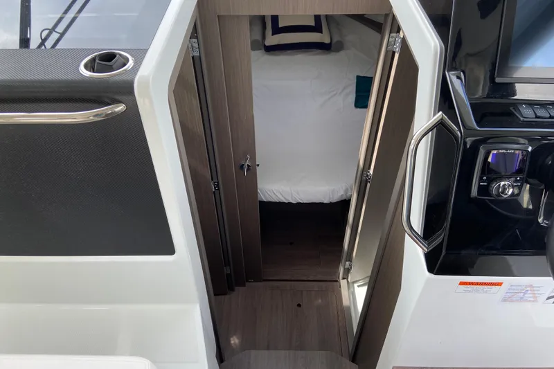 Slide: The Image of 2026 Jeanneau NC 895 Series 2 cabin interior with modern design and cozy bedding. - 38