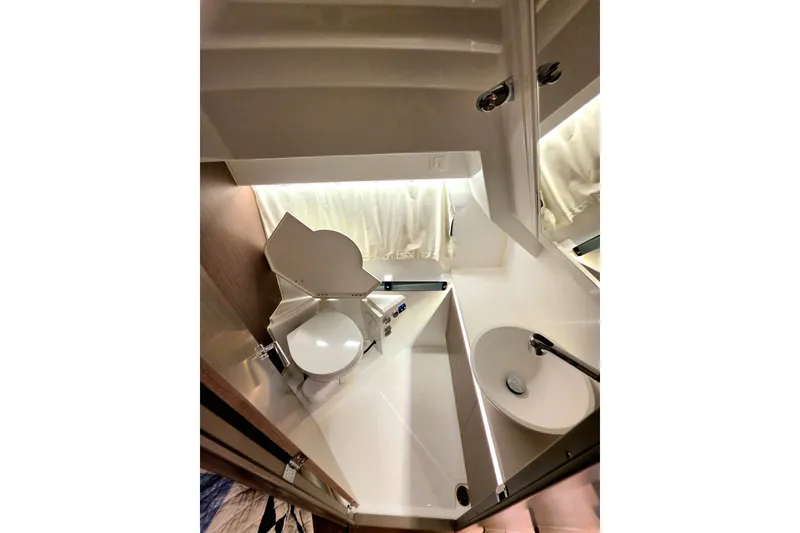 Slide: The Image of Modern bathroom interior of 2026 Jeanneau NC 895 Series 2 boat, featuring sleek design and fixtures. - 10