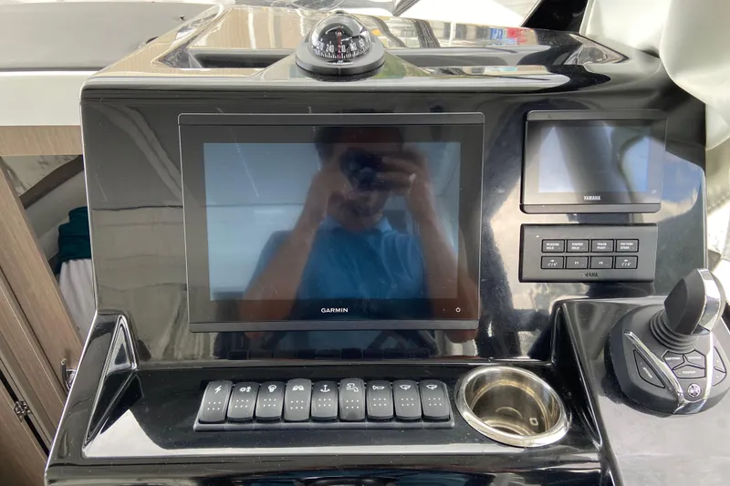 Slide: The Image of Helm of 2026 Jeanneau NC 895 Series 2 with Garmin and Yamaha displays. - 19