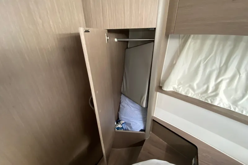 Slide: The Image of Interior storage space in the 2026 Jeanneau NC 895 Series 2 boat cabin. - 40