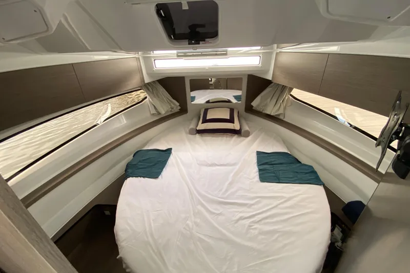 Slide: The Image of Interior cabin of 2026 Jeanneau NC 895 Series 2, featuring a cozy bed and modern design. - 42