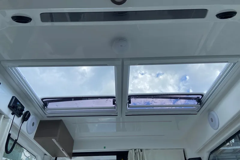 Slide: The Image of Interior view of 2026 Jeanneau NC 895 Series 2 boat with skylights and modern design. - 26