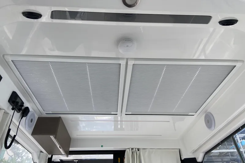 Slide: The Image of Interior ceiling view of 2026 Jeanneau NC 895 Series 2 boat with modern design features. - 24