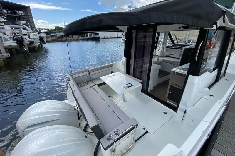 Slide: The Image of 2026 Jeanneau NC 895 Series 2 boat with spacious deck and modern interior design. - 9