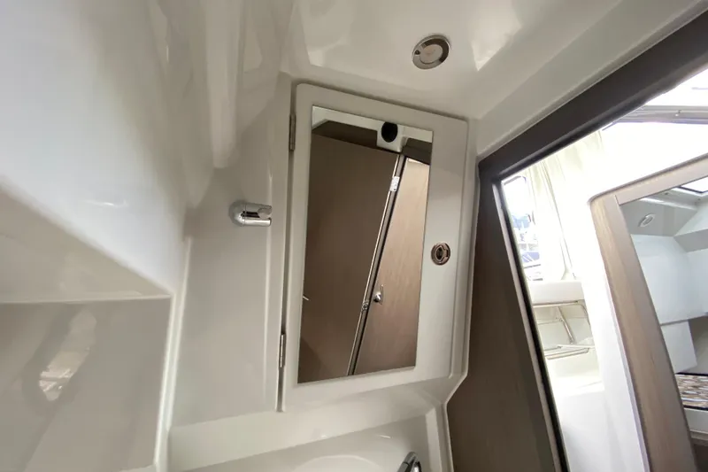 Slide: The Image of Interior of 2026 Jeanneau NC 895 Series 2 boat, featuring a modern bathroom design. - 51