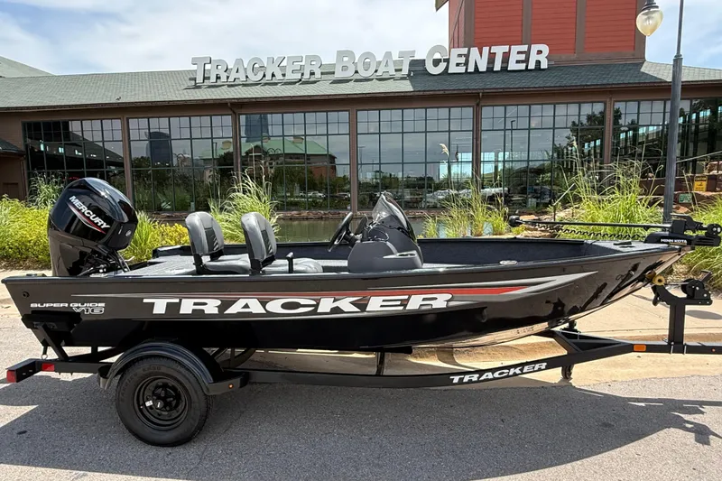 Slide: The Image of 2026 Tracker Super Guide V-16 SC boat at Tracker Boat Center, featuring sleek black design. - 3