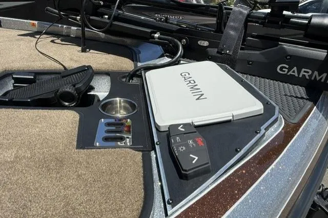 Slide: The Image of 2026 Ranger Z521R Cup-Equipped boat dashboard with Garmin navigation system and controls. - 7