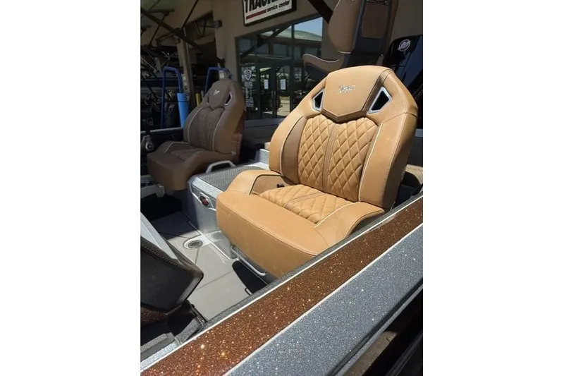 Slide: The Image of Luxurious tan seats in 2026 Ranger Z521R Cup-Equipped boat, showcasing premium design. - 9