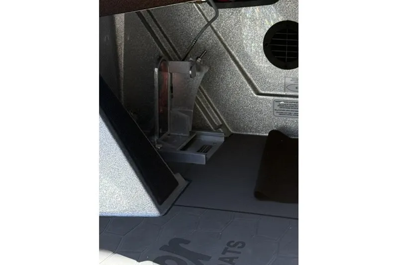Slide: The Image of Interior view of 2026 Ranger Z521R Cup-Equipped boat, showcasing pedal and floor details. - 12