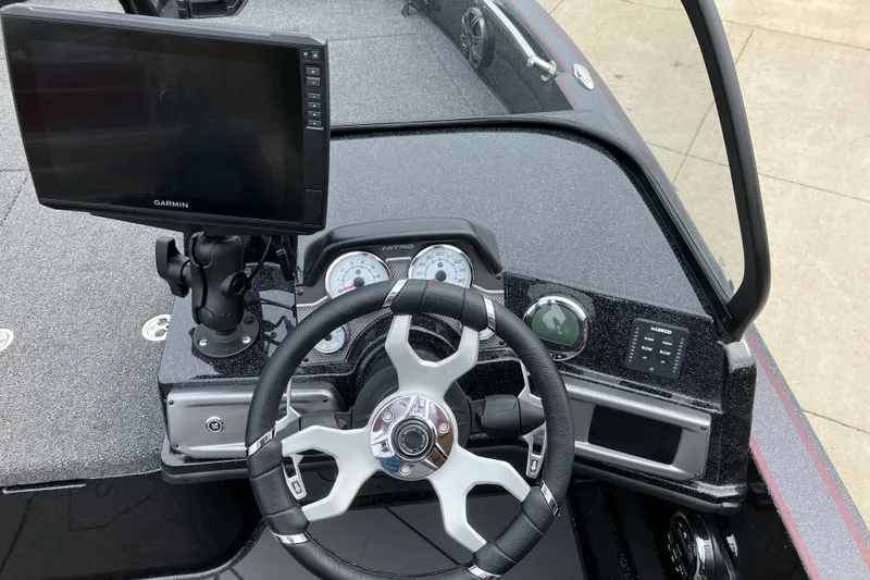 Slide: The Image of Steering console of 2026 Nitro ZV20 Pro boat with Garmin display and controls. - 5