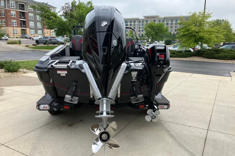 Slide: The Image of Rear view of a 2026 Nitro ZV20 Pro boat with dual Mercury engines. - 2