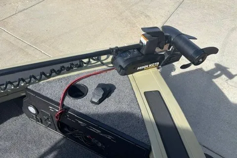 Slide: The Image of 2026 Tracker Targa V-19 WT boat with Minn Kota trolling motor on deck. - 16
