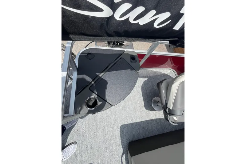 Slide: The Image of 2026 Sun Tracker Bass Buggy 18 DLX boat interior with seating and deck details. - 5