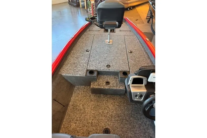 Slide: The Image of 2026 Tracker Pro Team 190 boat interior with seating and control panel. - 11