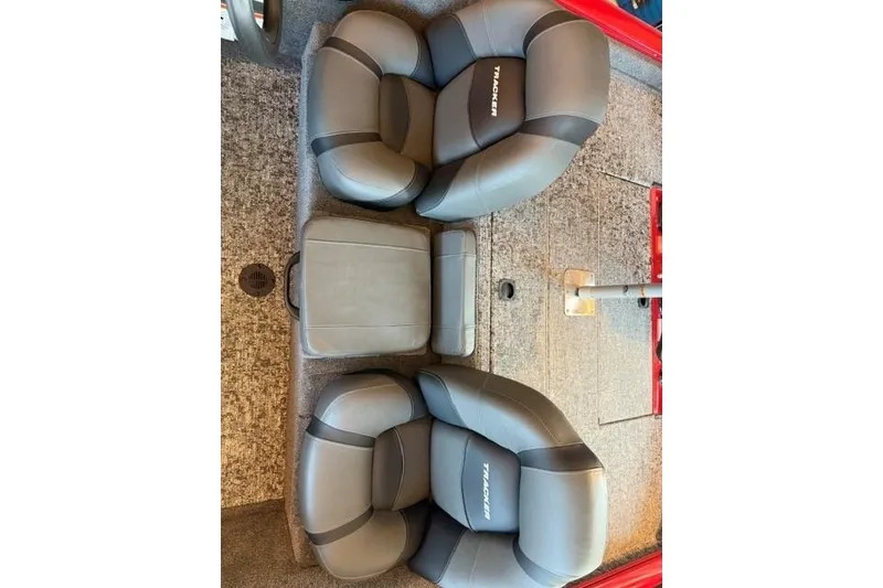 Slide: The Image of 2026 Tracker Pro Team 190 boat seats, gray and black upholstery, top view. - 8