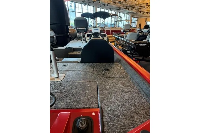Slide: The Image of 2026 Tracker Pro Team 190 boat interior with seating and storage compartments. - 5