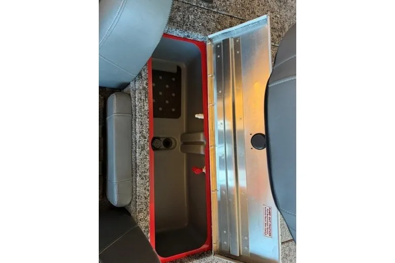 Slide: The Image of Open storage compartment in 2026 Tracker Pro Team 190 boat interior. - 10