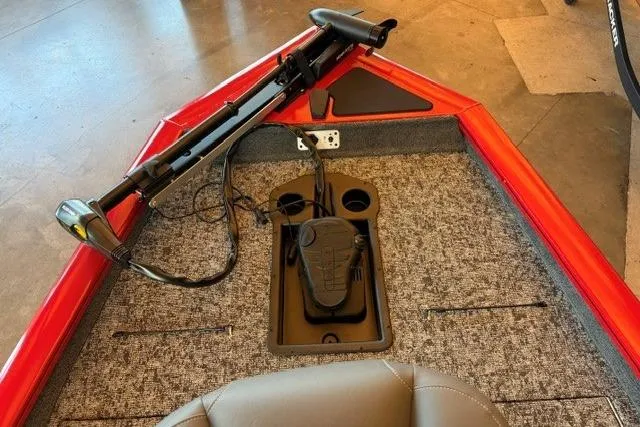 Slide: The Image of 2026 Tracker Pro Team 190 boat interior with trolling motor and foot pedal. - 12