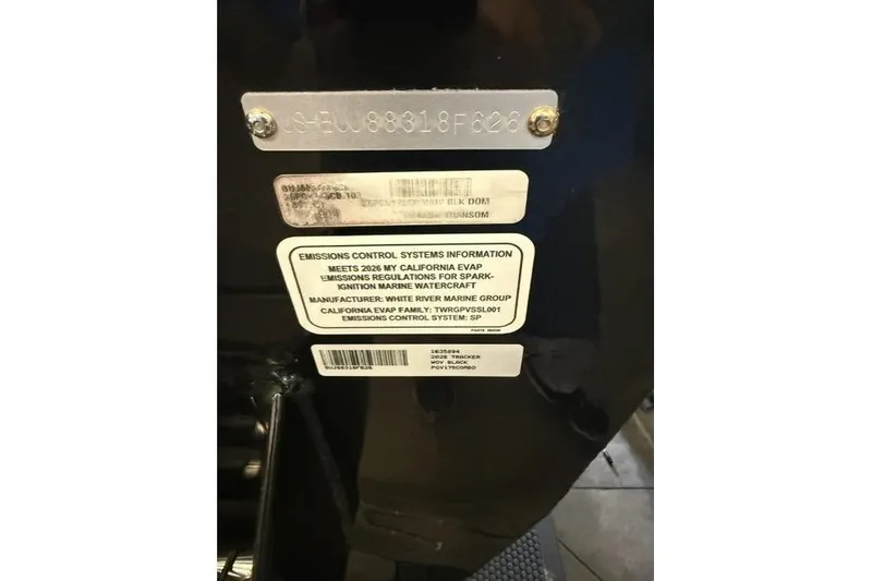 Slide: The Image of 2026 Tracker Pro Guide V-175 Combo emissions control information label on marine watercraft. - 12