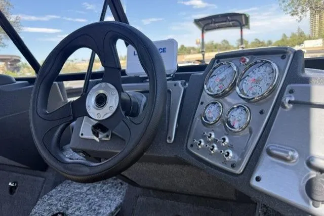 Slide: The Image of 2026 Tracker Pro Guide V-175 Combo dashboard with steering wheel and instrument panel. - 10