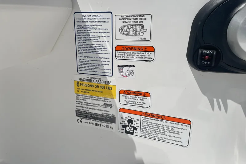 Slide: The Image of Safety and capacity labels on a 2026 Tahoe T16 boat, detailing warnings and maximum load. - 21