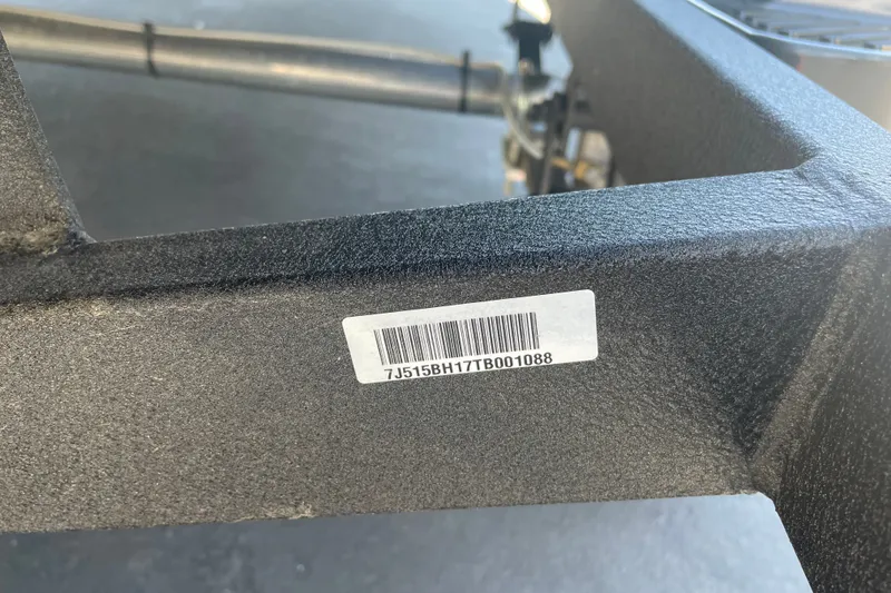 Slide: The Image of Barcode sticker on a 2026 Tahoe T16 vehicle frame. - 83