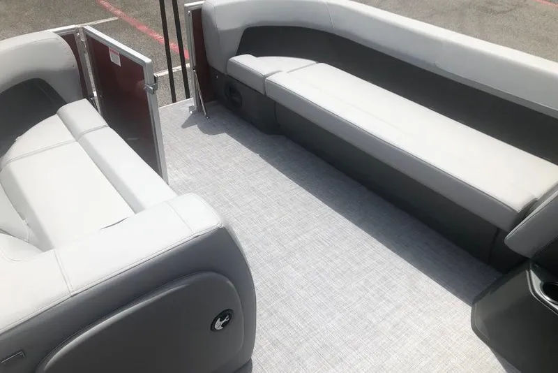 Slide: The Image of 2026 Sun Tracker Party Barge 18 DLX interior with spacious seating and modern design. - 7