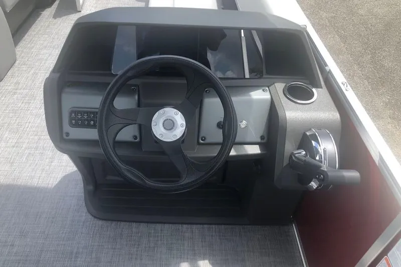 Slide: The Image of Steering console of 2026 Sun Tracker Party Barge 18 DLX pontoon boat. - 9