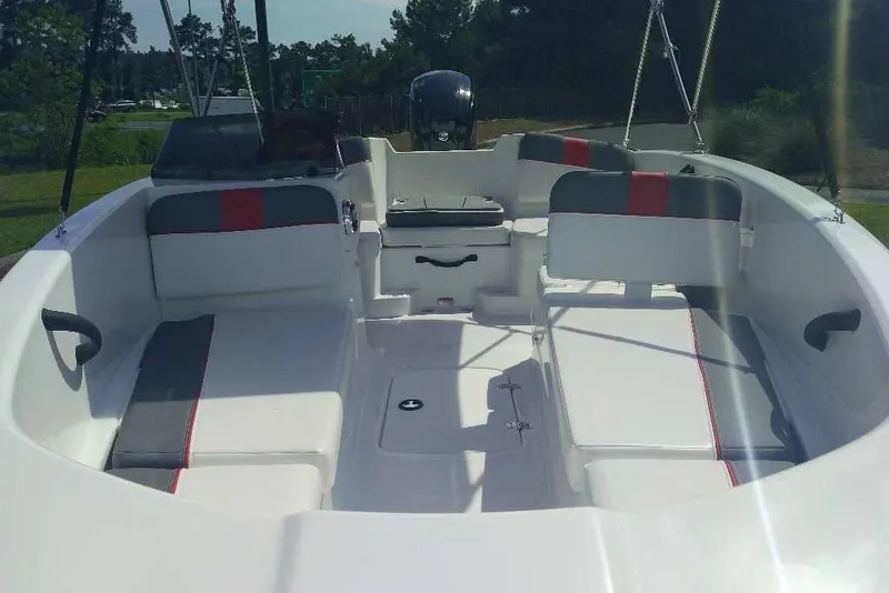 Slide: The Image of 2026 Tahoe T16 boat interior with seating and storage, featuring modern design and spacious layout. - 2