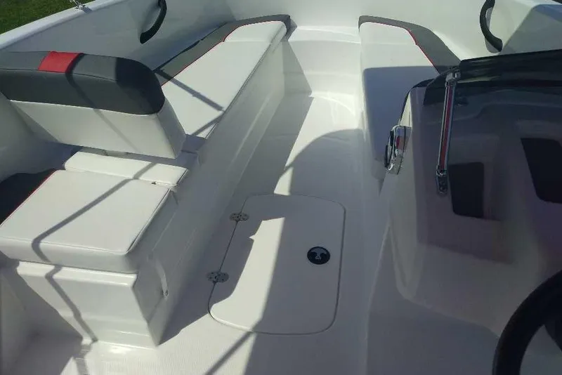 Slide: The Image of Interior view of 2026 Tahoe T16 boat with seating and storage compartments. - 7