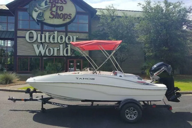 Slide: The Image of 2026 Tahoe T16 boat with red canopy at Bass Pro Shops Outdoor World. - 9