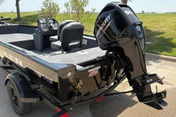Slide: The Image of 2026 Tracker Super Guide V-16 SC boat with Mercury 50 HP engine, parked on trailer. - 47