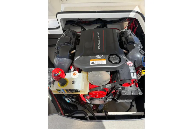 Slide: The Image of Volvo Penta engine in 2022 Regal 22 FasDeck boat, showcasing V6 280 horsepower. - 17