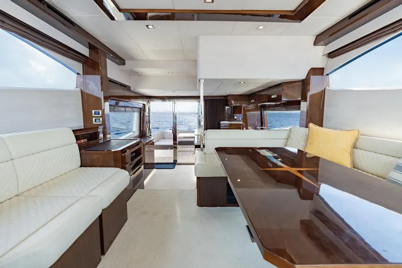 Slide: The Image of Luxurious interior of 2017 Galeon 550 Fly yacht with elegant seating and ocean view. - 28