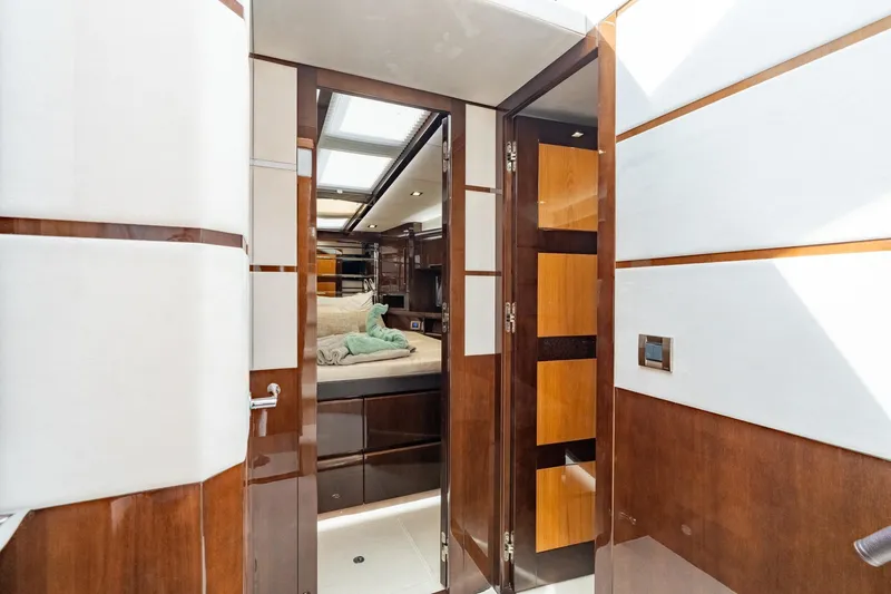 Slide: The Image of Luxurious interior of 2017 Galeon 550 Fly yacht, featuring elegant wood finishes and modern design. - 43