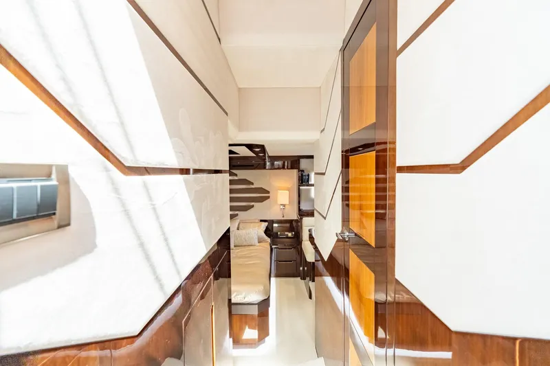 Slide: The Image of Luxurious interior of 2017 Galeon 550 Fly yacht with modern design and elegant wood finishes. - 36
