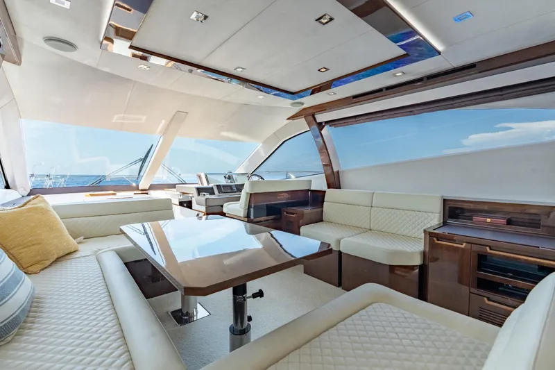 Slide: The Image of Luxurious interior of 2017 Galeon 550 Fly yacht with elegant seating and ocean view. - 31