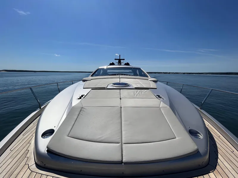 Slide: The Image of Luxury yacht with sun deck on calm water under clear sky. - 26