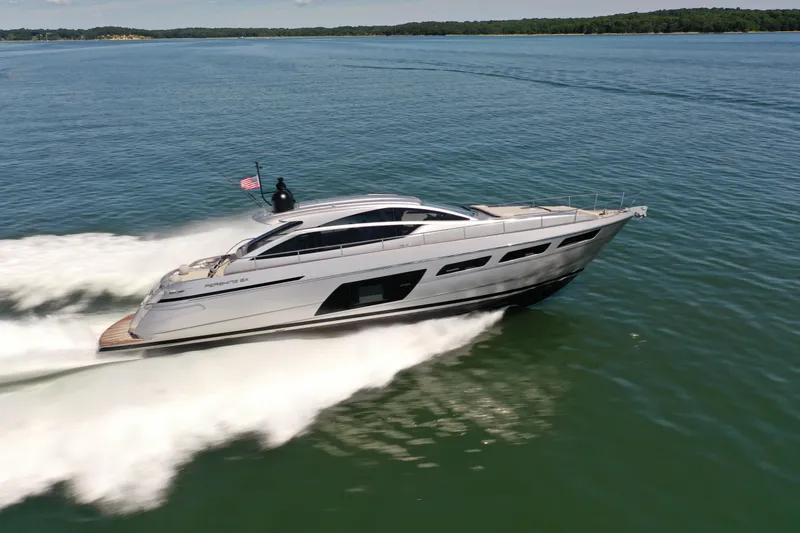 Slide: The Image of A sleek, modern boat speeding across the water. - 3