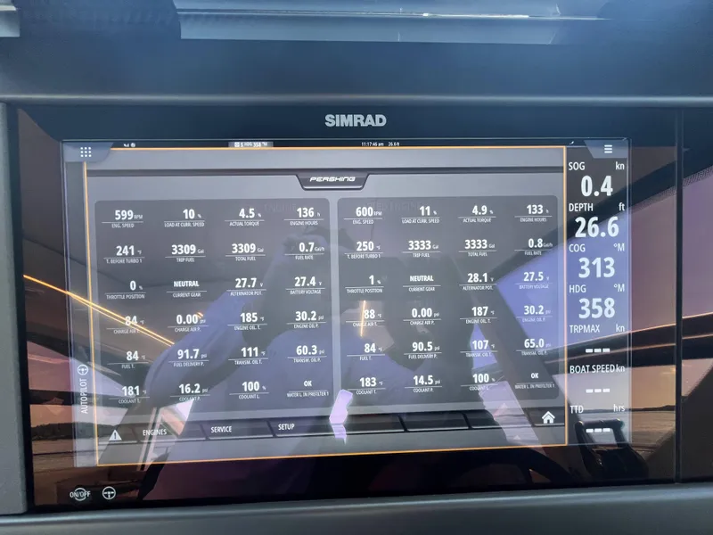 Slide: The Image of A Simrad screen displaying various boat data and statistics. - 36