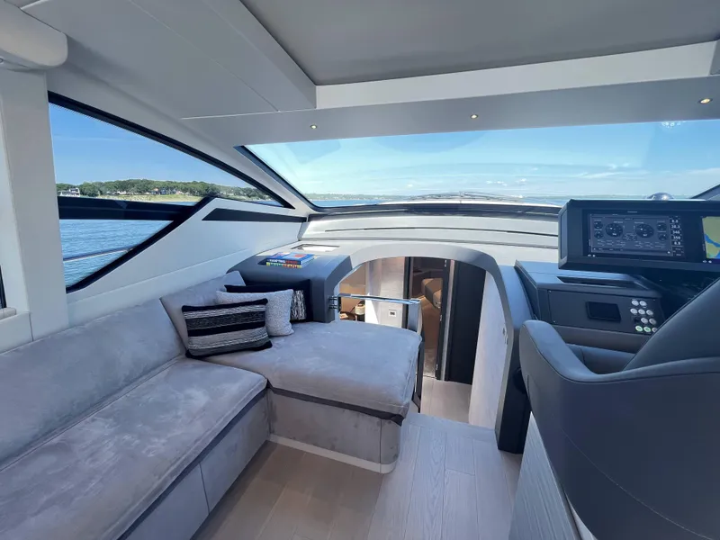 Slide: The Image of Interior of a modern yacht with gray upholstery and large windows. - 8