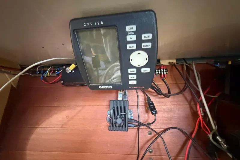 Slide: The Image of Garmin GPS device installed on a 1991 Hylan Offshore Steel Cutter boat. - 8