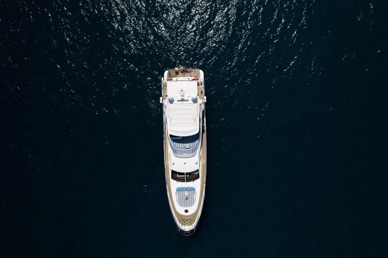 Slide: The Image of Aerial view of 2011 Azimut 70 yacht on dark blue water. - 3
