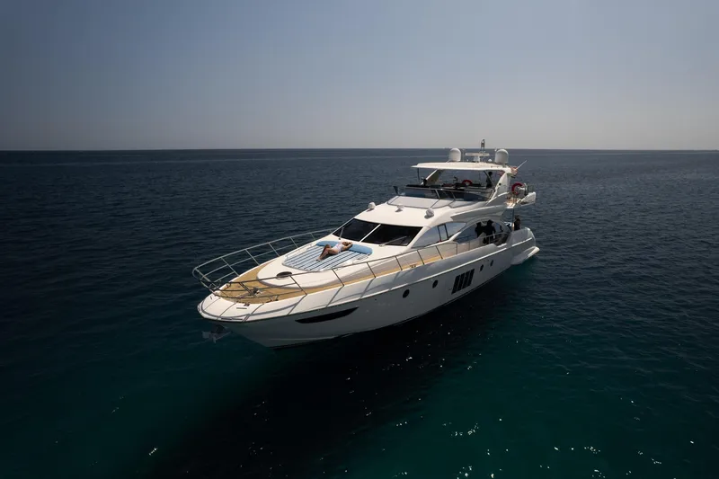 Slide: The Image of Luxurious 2011 Azimut 70 yacht cruising on calm, open sea under clear skies. - 8